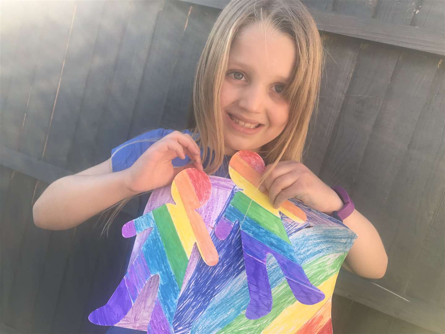 Liv, 6, with her rainbow artwork (32379196)