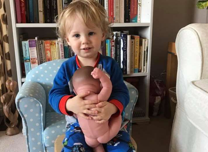 Noah with his doll