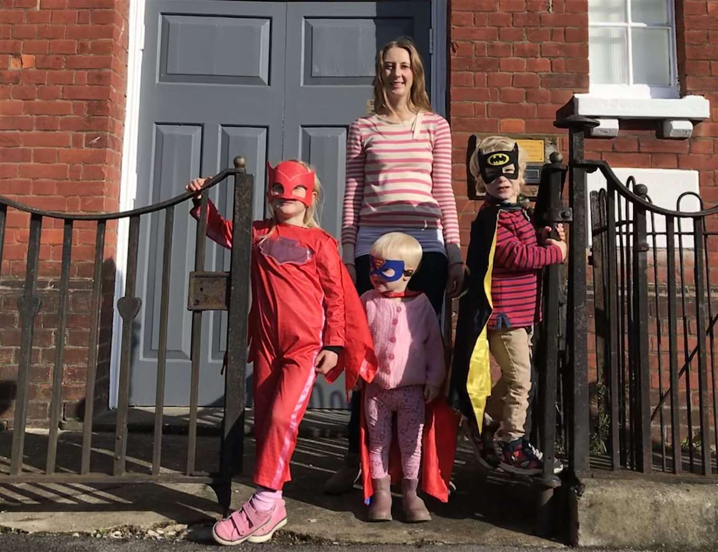 Hayley and her family outside the new play centre