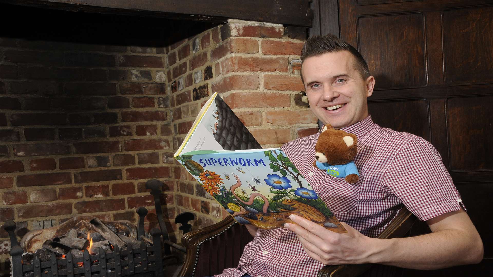 Phil Gallagher (star of CBeebies' Mister Maker) and KM Charity Team mascot Ted the bear.