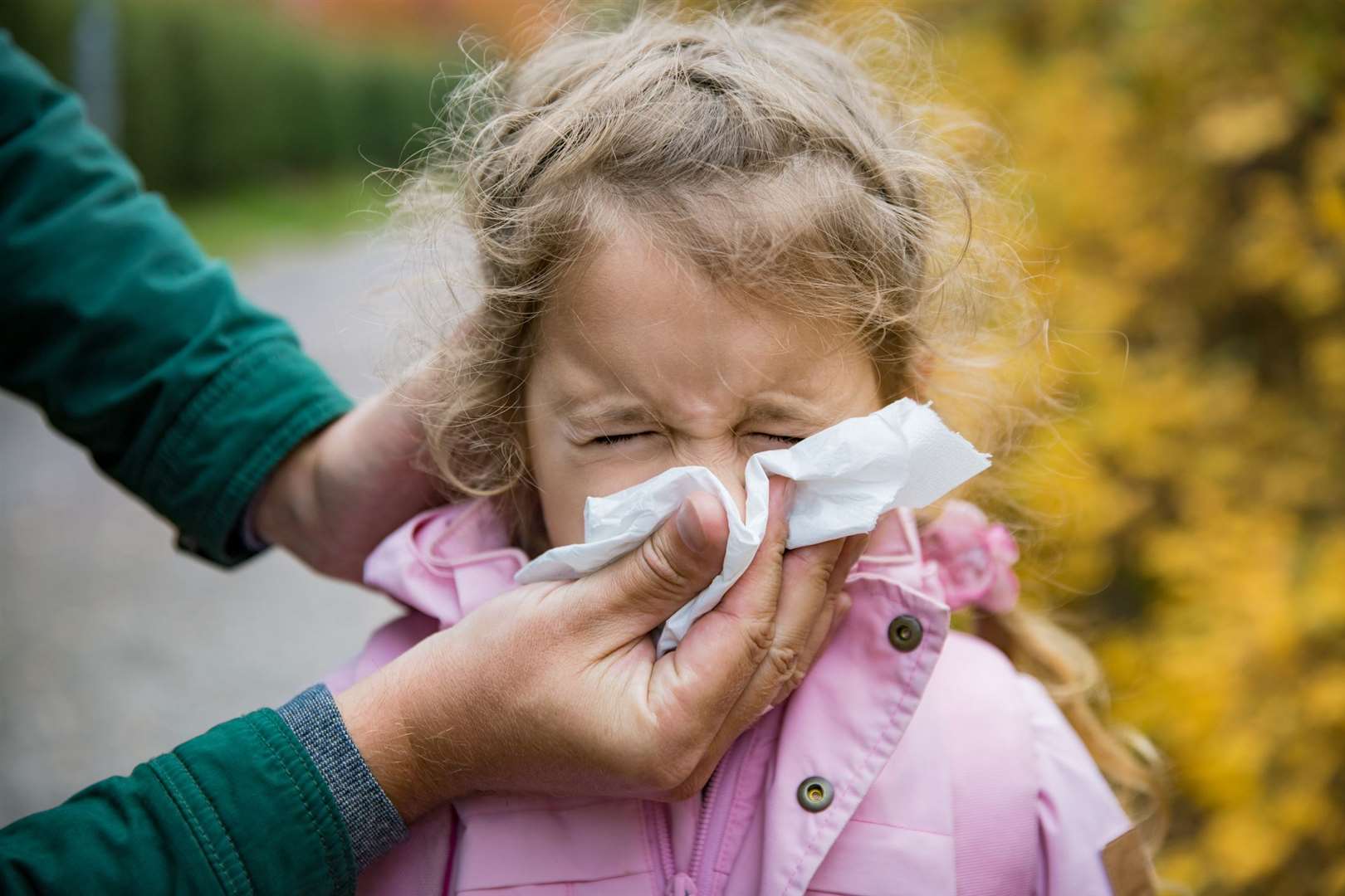 Sneezing and running noses are not coronavirus symptoms, parents have been told
