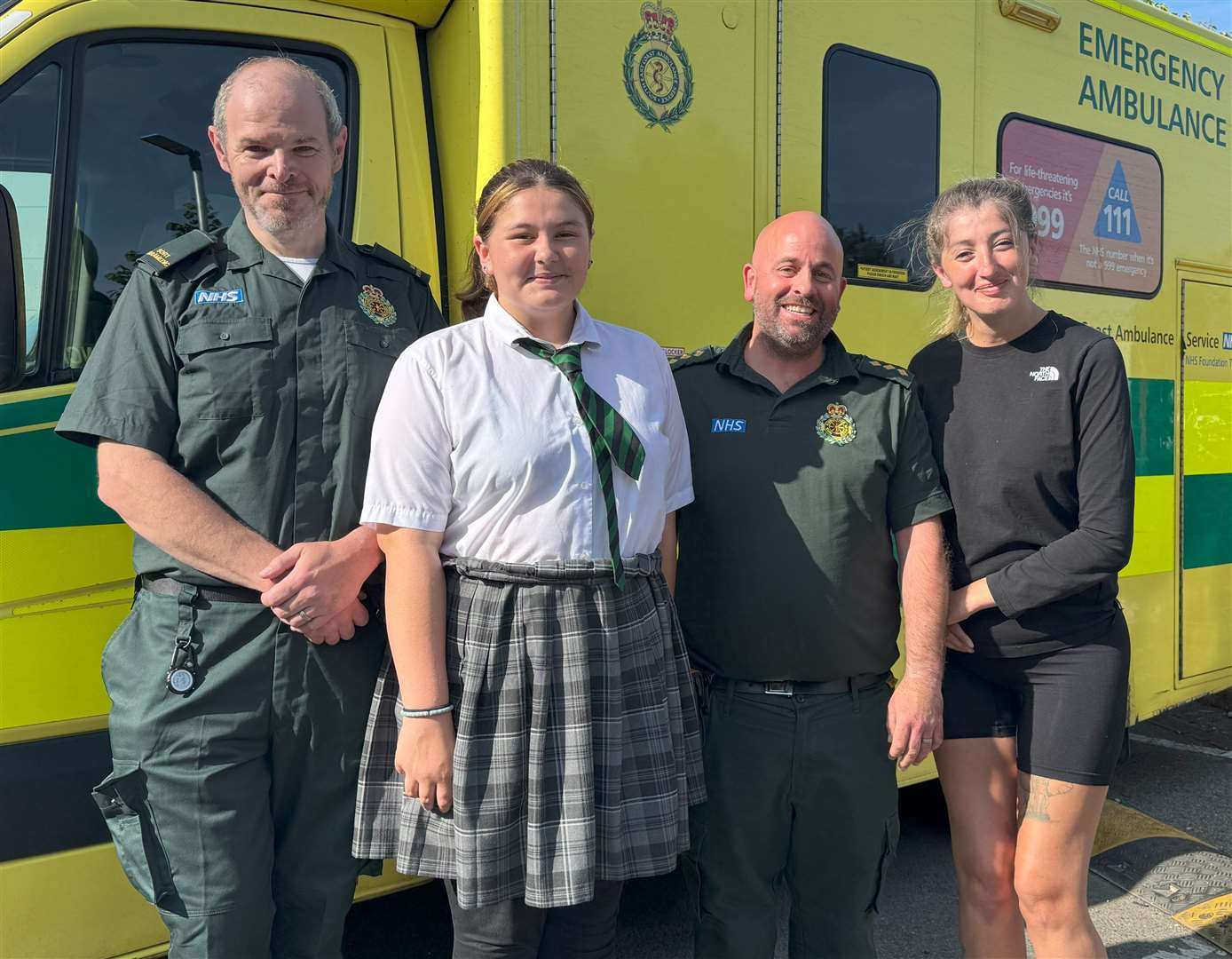 Sophie Dougherty with her daughter Jade and members of the ambulance crew who helped save her life. Picture: Secamb