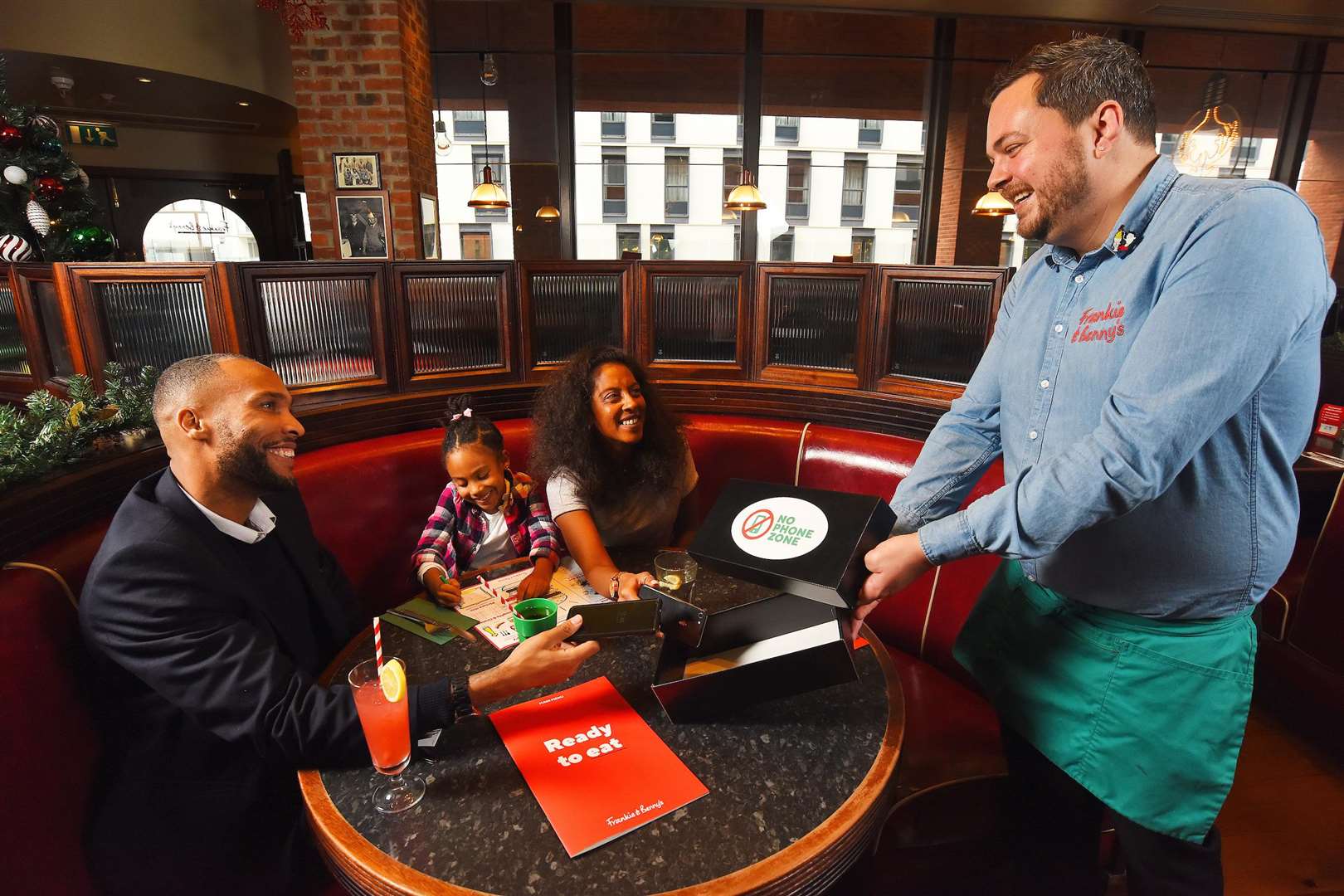 Parents will be asked to put their phones in boxes at the table